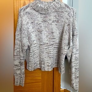 Cute work sweater also goes good with jeans leggings and even shorts. very warm.